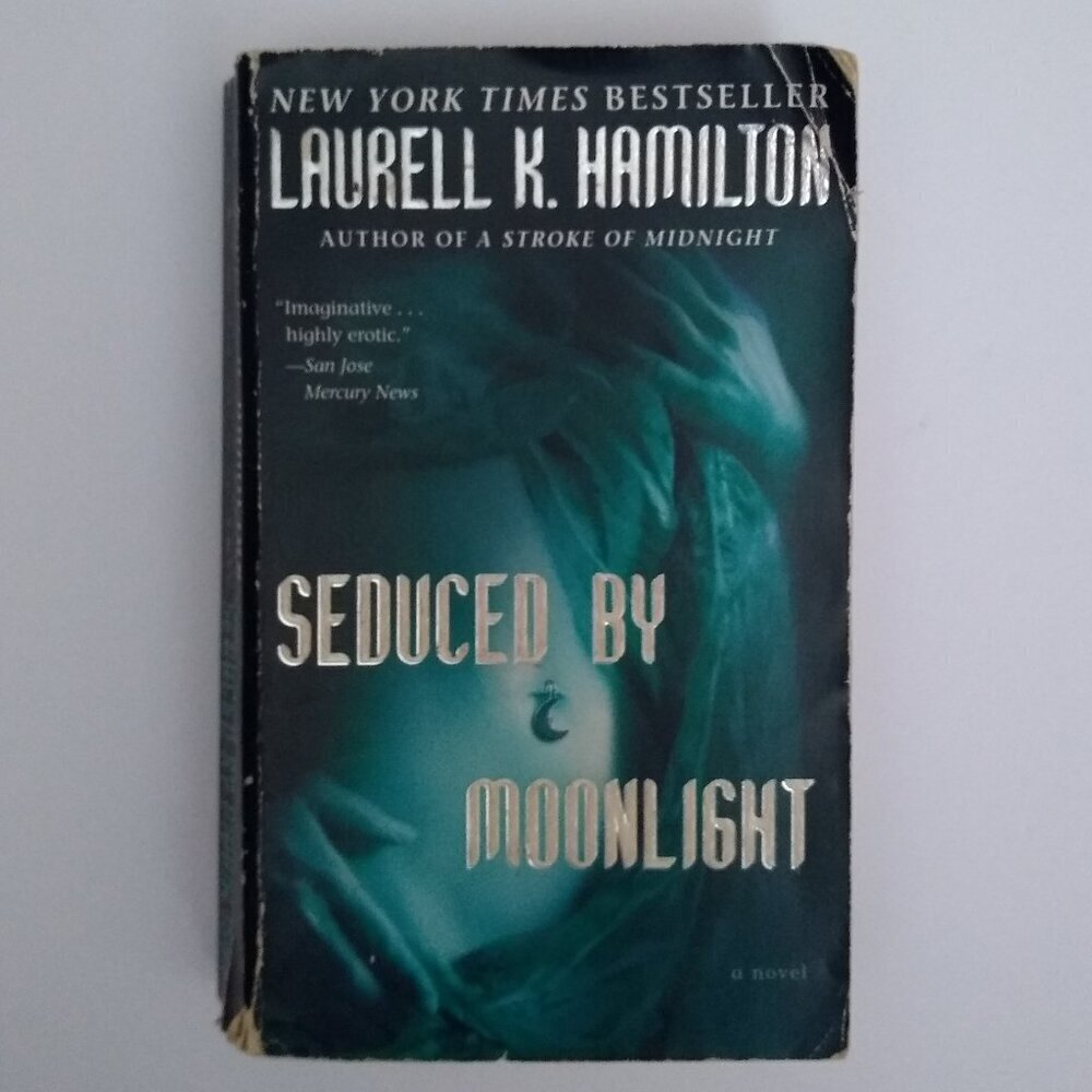 Seduced by Moonlight (Merry Gentry #3) Laurell K. Hamilton PAPERBACK